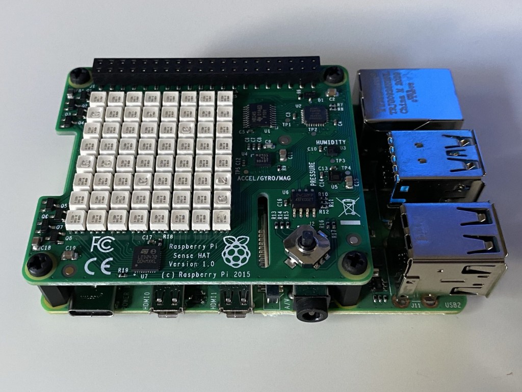Raspberry Pi device and Sense HAT assembled