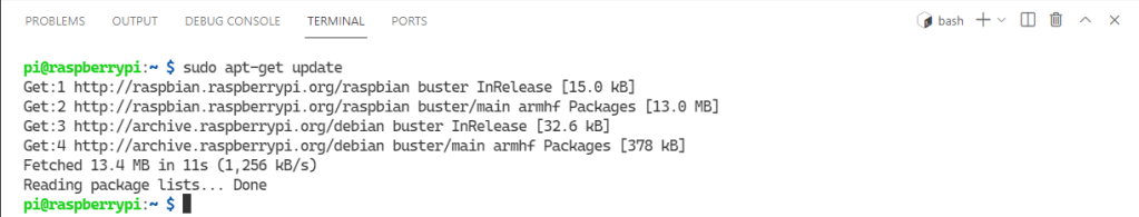 VS Code terminal with installation status messages.