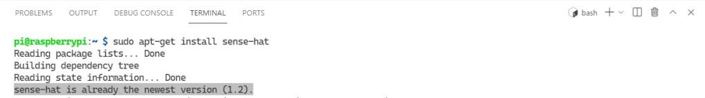 VS Code terminal with package status messages.